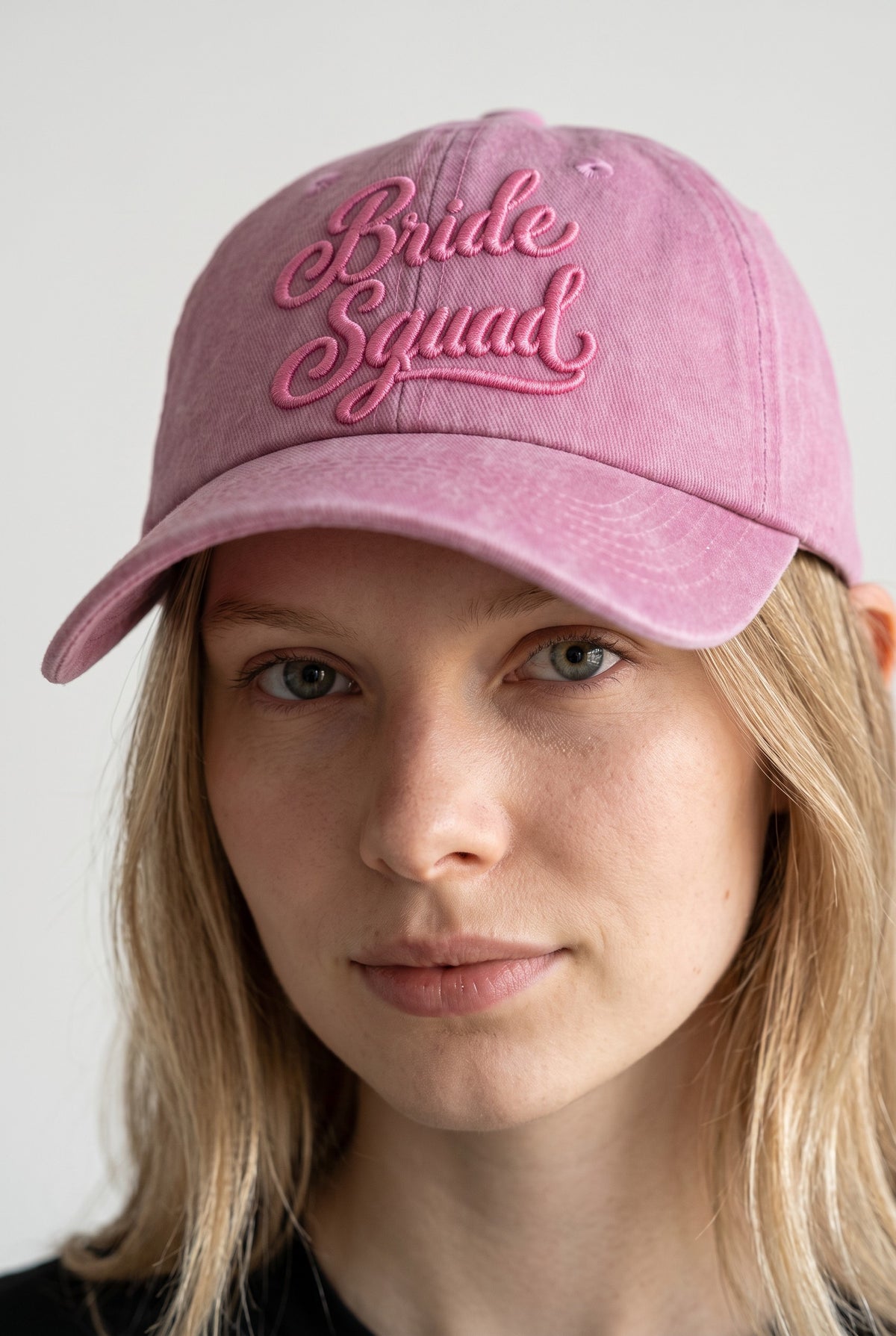 Bride Squad Hats worn by a model, front view