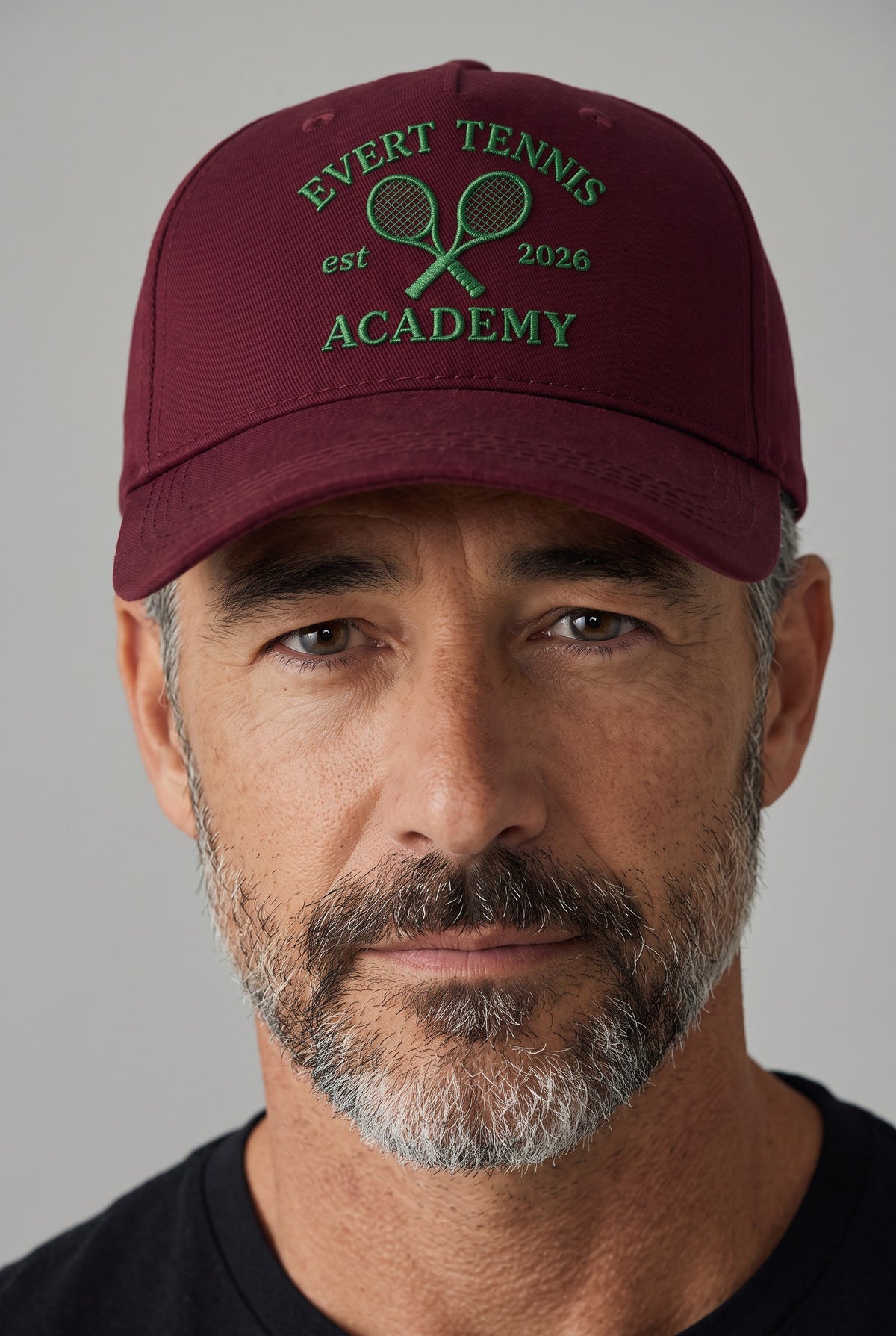 Tennis Academy Hat worn by a model, front view