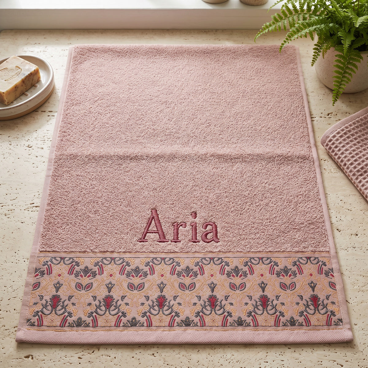 Aria personalized hair towel, dusty rose serif embroidery on blush pink cotton with a patterned border — photo 5