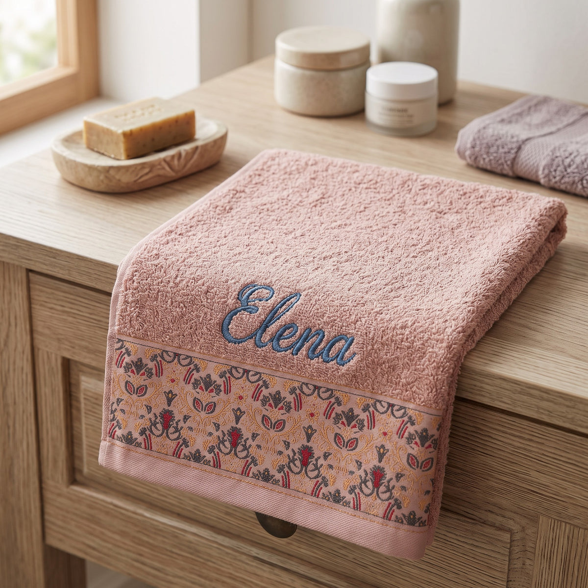 Elena personalized hair towel, cornflower blue script embroidery on blush pink cotton with a patterned border — photo 4