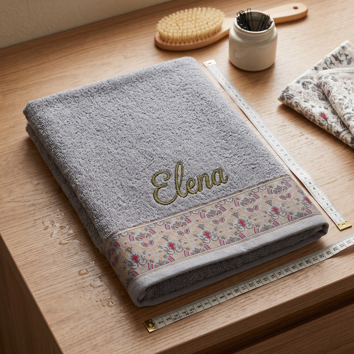 Elena personalized hair towel, olive green script embroidery on light gray cotton with a patterned border — photo 5