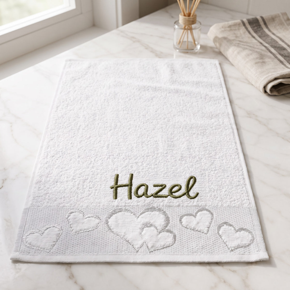 Hazel personalized heart hand towel, olive green script embroidery on white cotton — photo 4