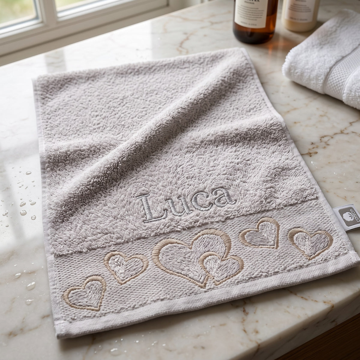 Luca personalized heart hand towel, charcoal grey serif embroidery on mauve cotton — photo 4