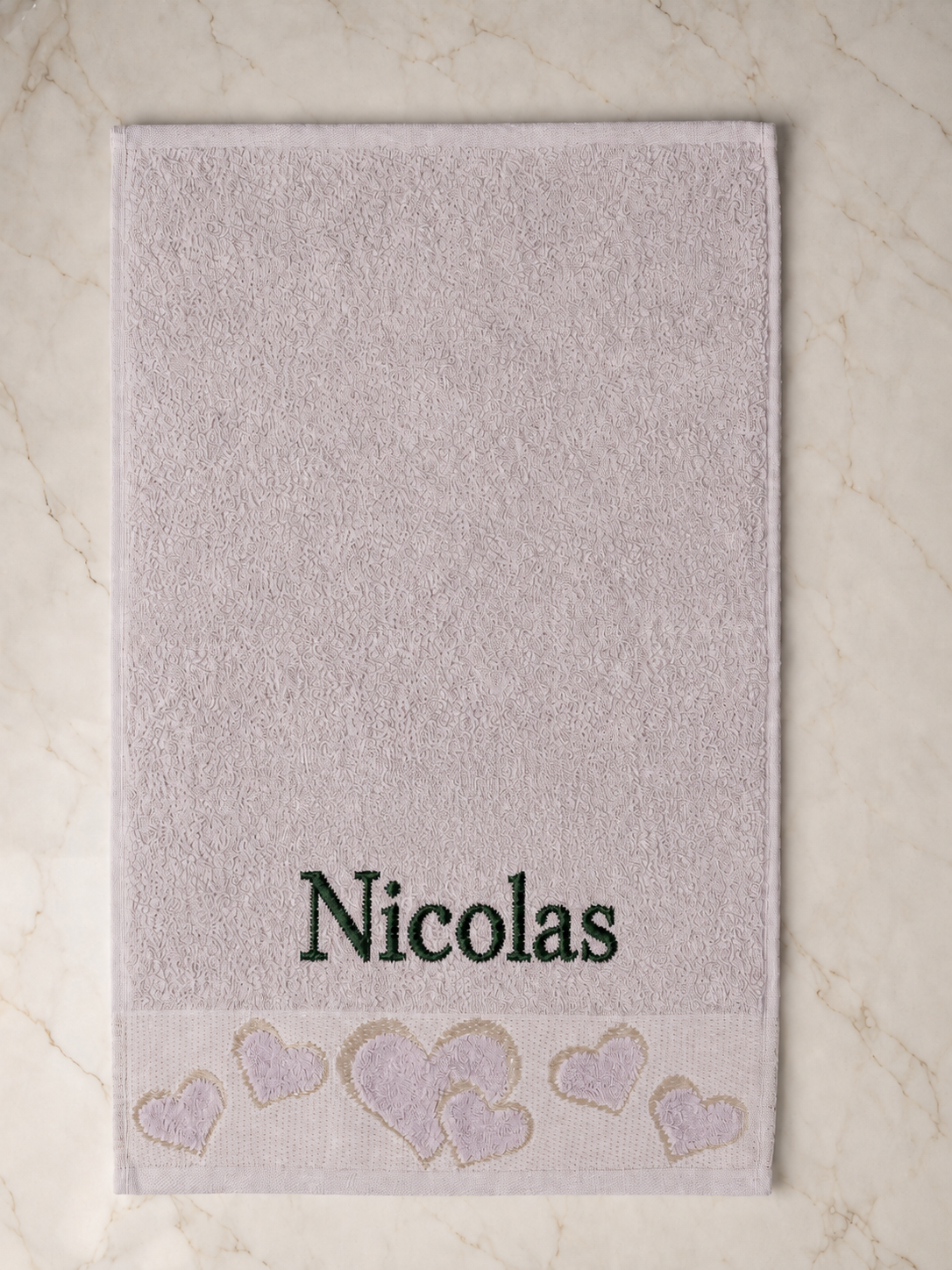 Nicolas personalized heart hand towel, forest green serif embroidery on mauve cotton