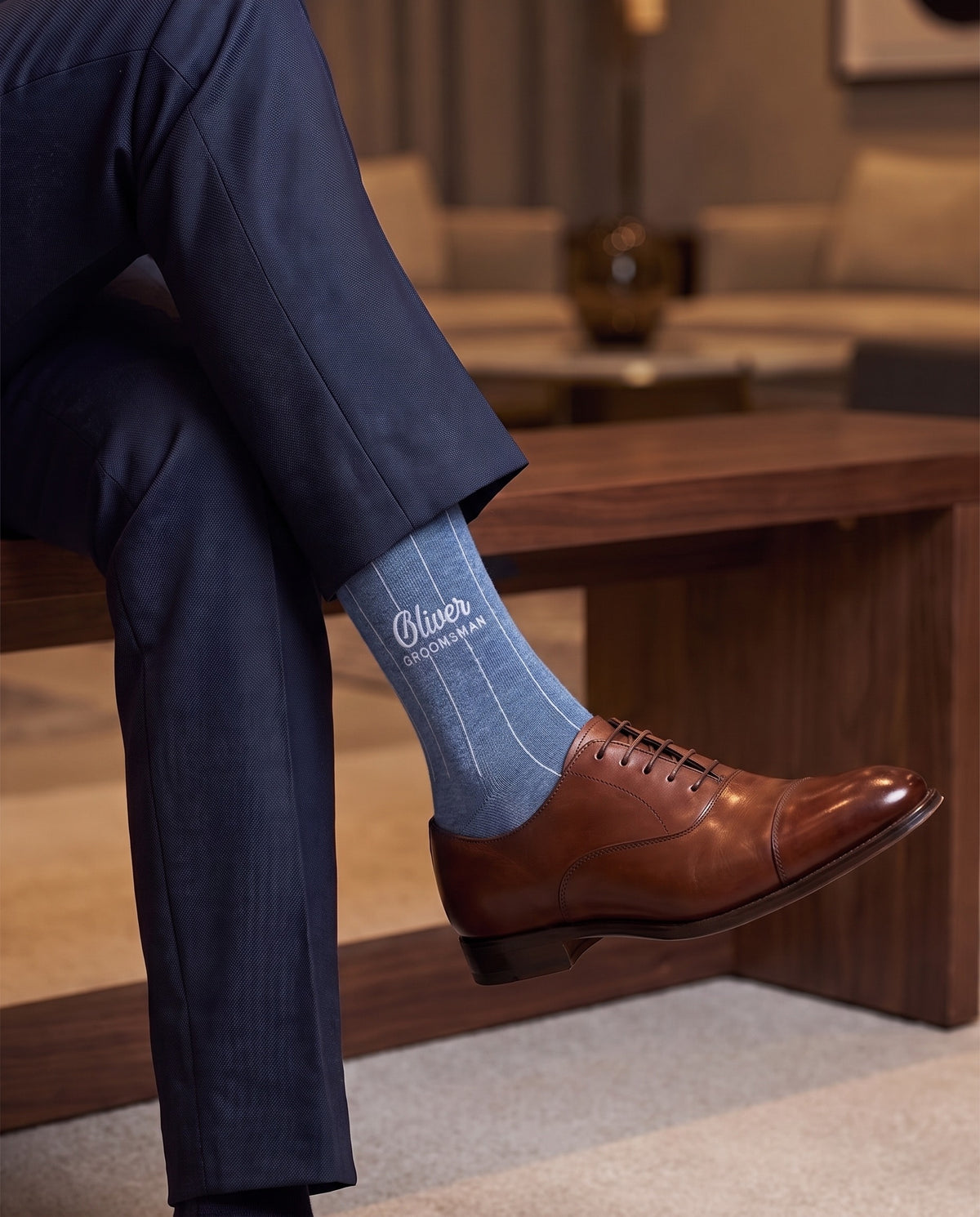 Model wearing indigo melange embroidered groom dress socks