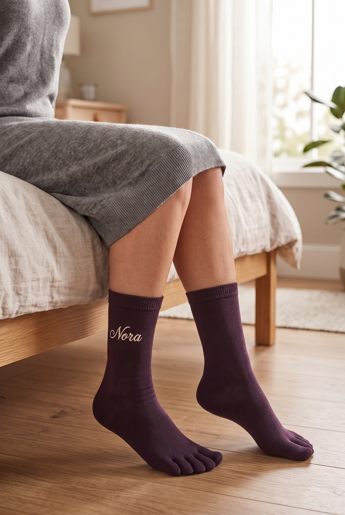 Model wearing dark brown embroidered toe socks, seen from the side