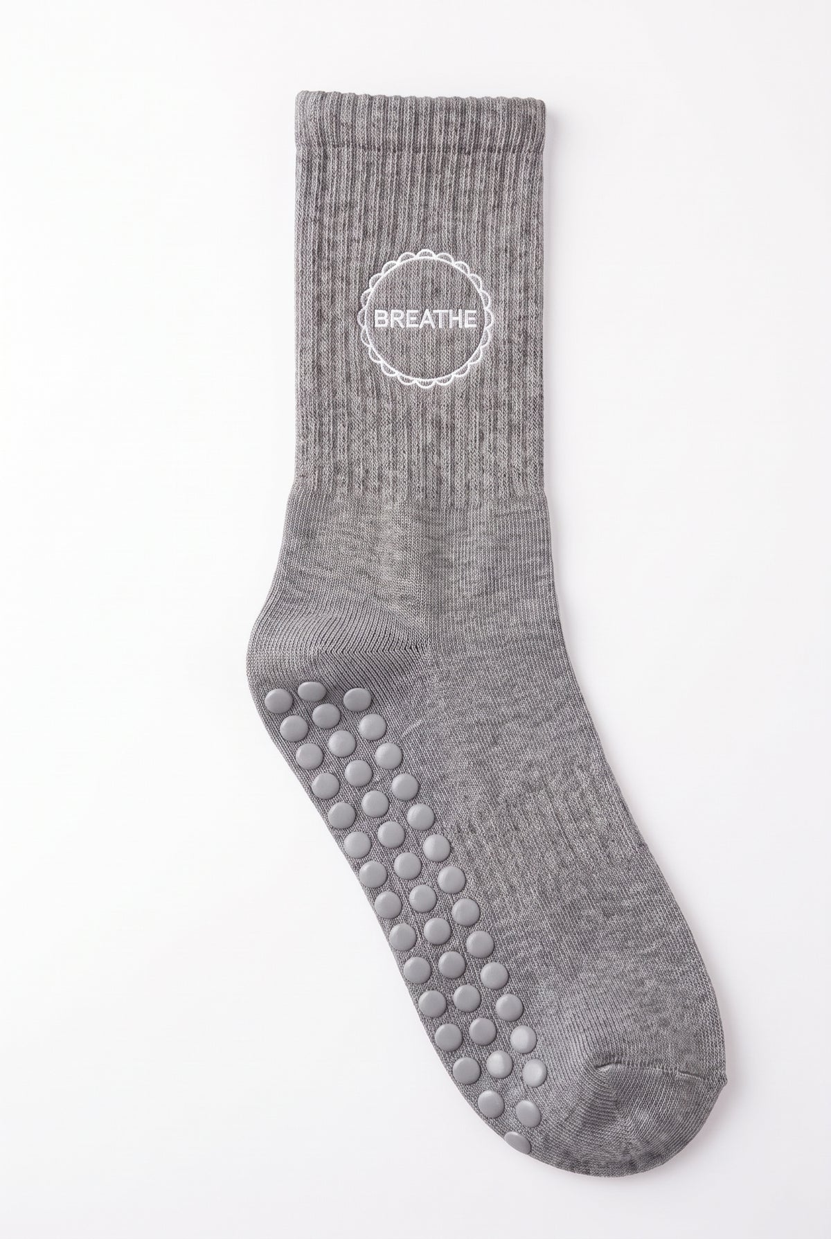 Grey dot grip pilates socks with custom embroidery on the cuff