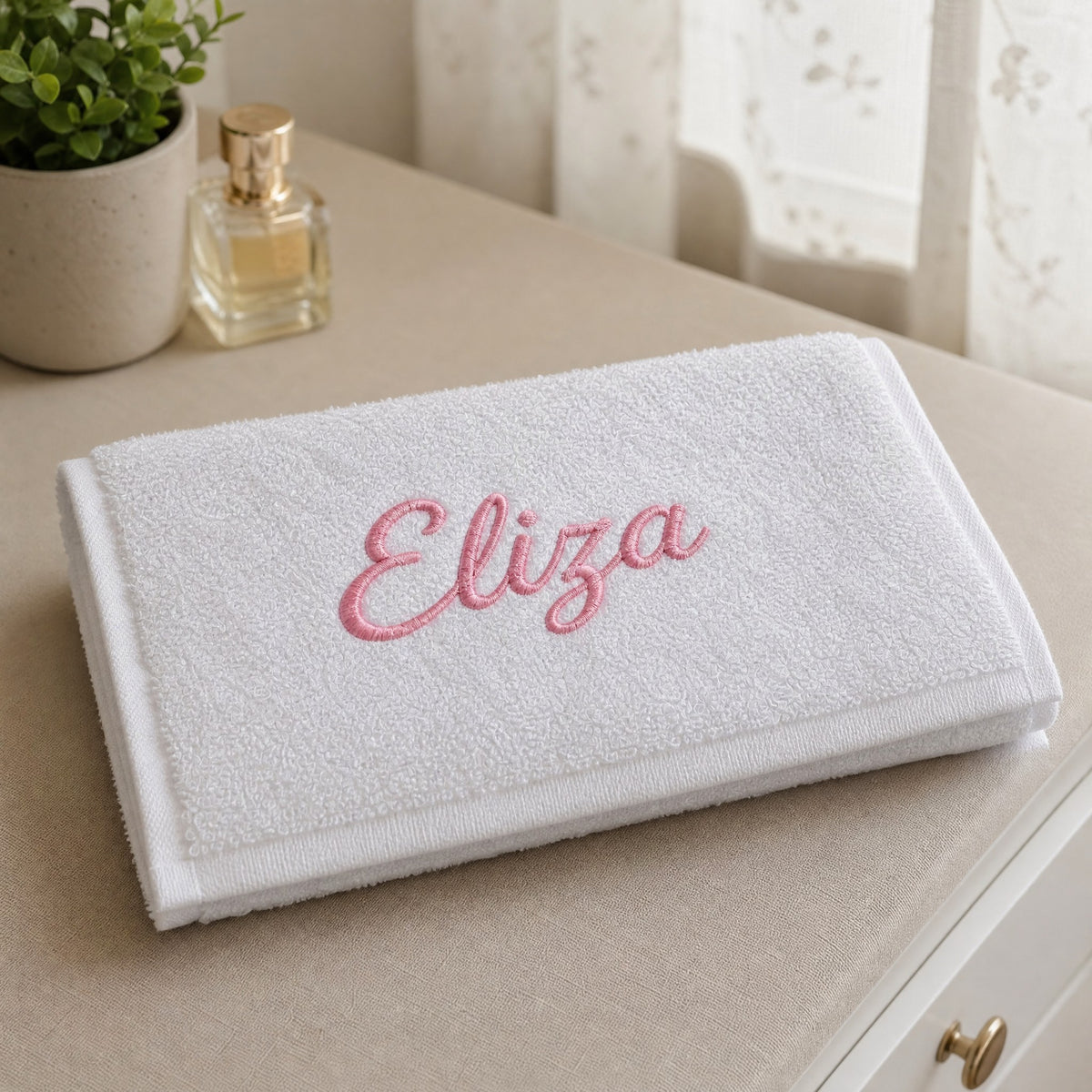 Eliza personalized bamboo hand towel, pink script embroidery on white — photo 3