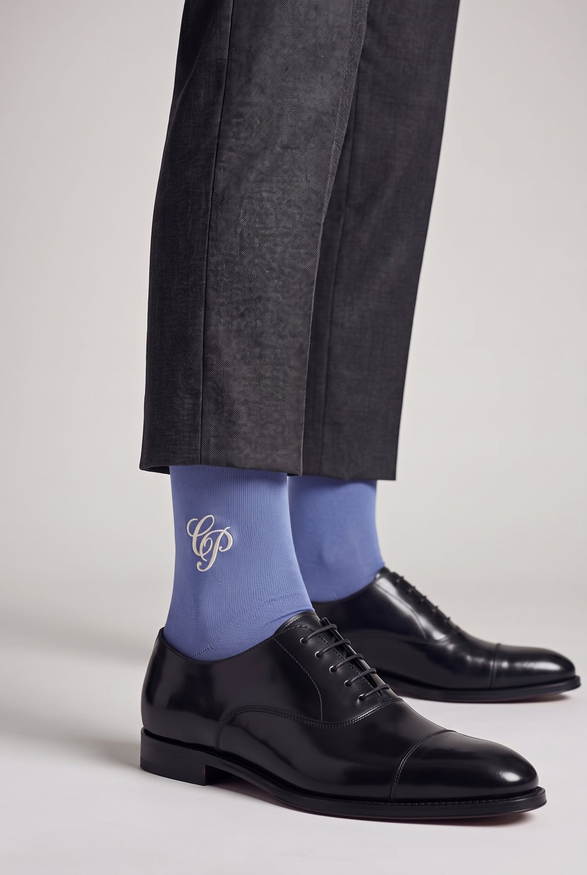 Blue personalized embroidered plain dress socks, worn, second angle — made to order