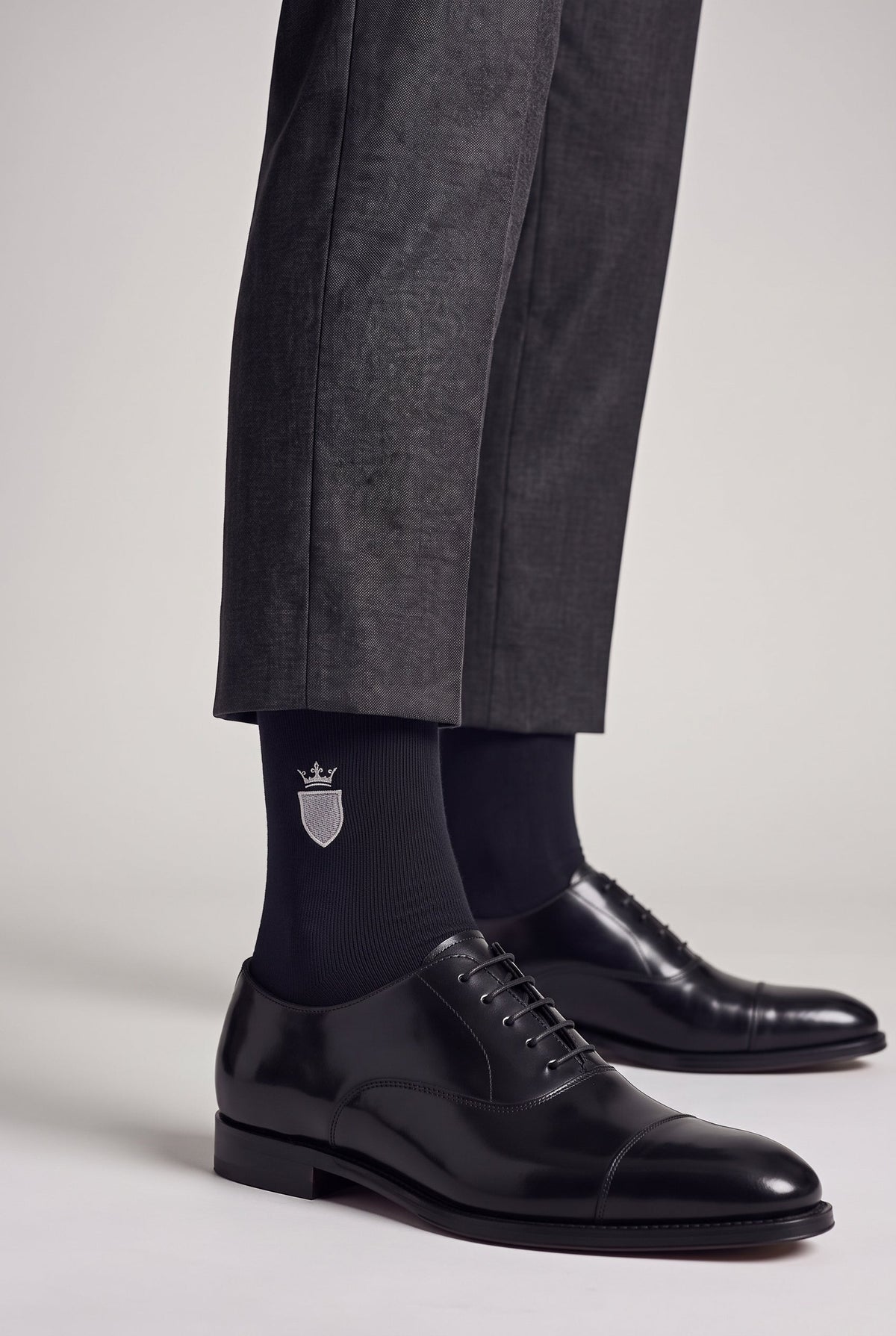 Black personalized embroidered plain dress socks, worn, second angle — made to order