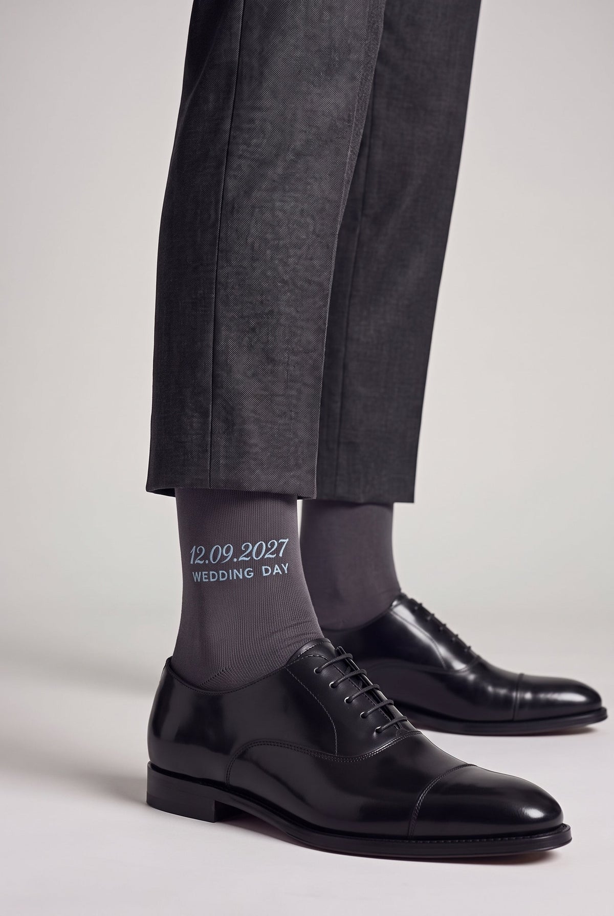 Charcoal personalized embroidered plain dress socks, worn, second angle — made to order