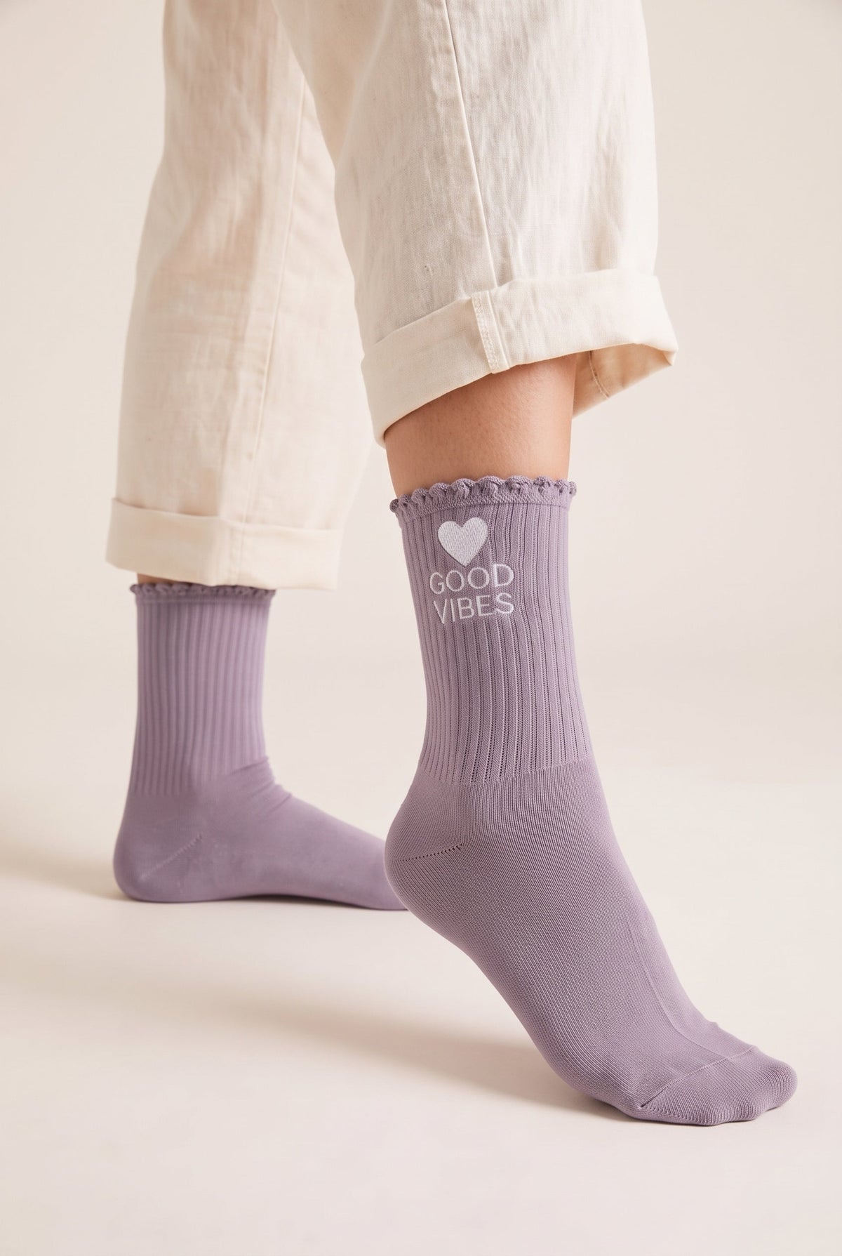 Lilac Grey personalized embroidered ruffle socks, worn, second angle — made to order