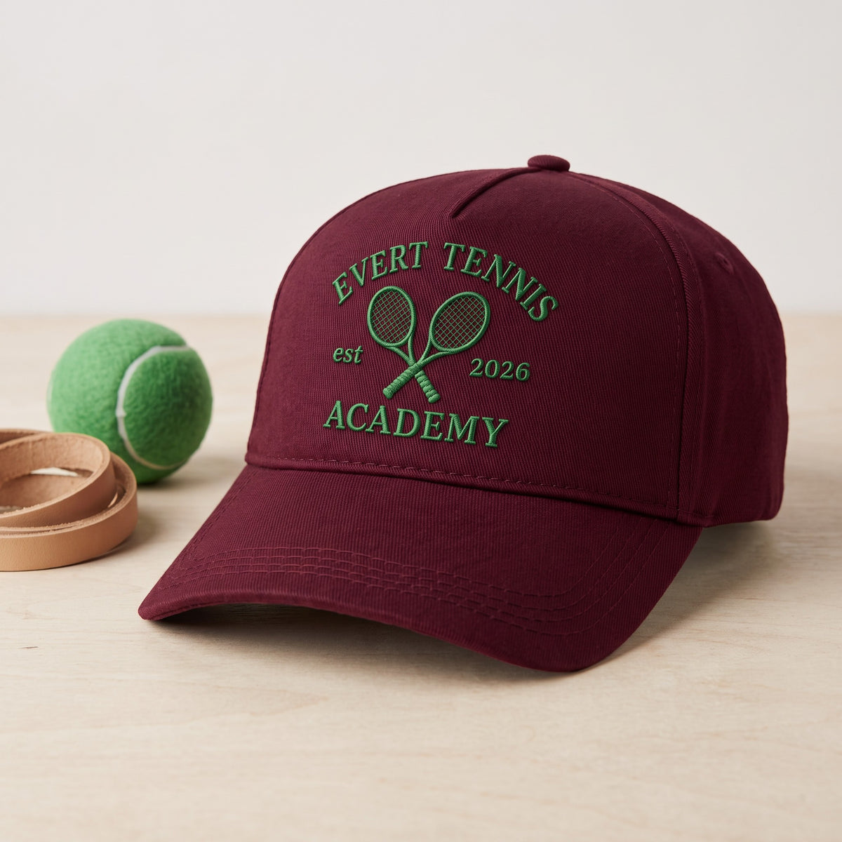Tennis Academy Hat styled flat lay, embroidery detail