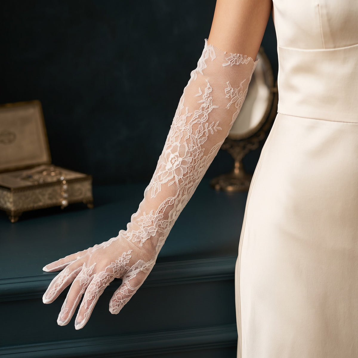 Above-elbow white Chantilly lace gloves with scalloped edges, fingers covered.