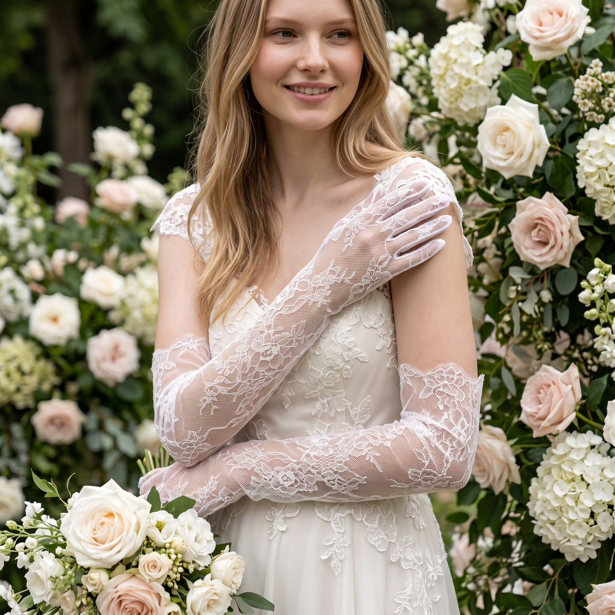 Above-elbow white Chantilly lace gloves with scalloped edges, fingers covered.