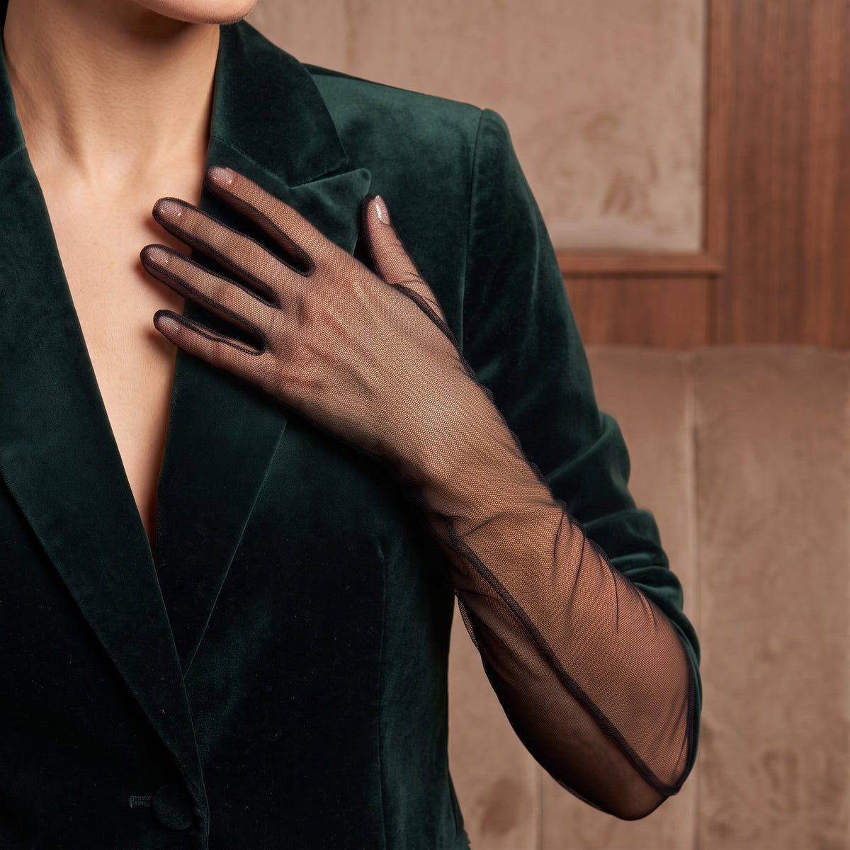 Above-elbow black sheer tulle gloves, plain and unlined, fingers covered.