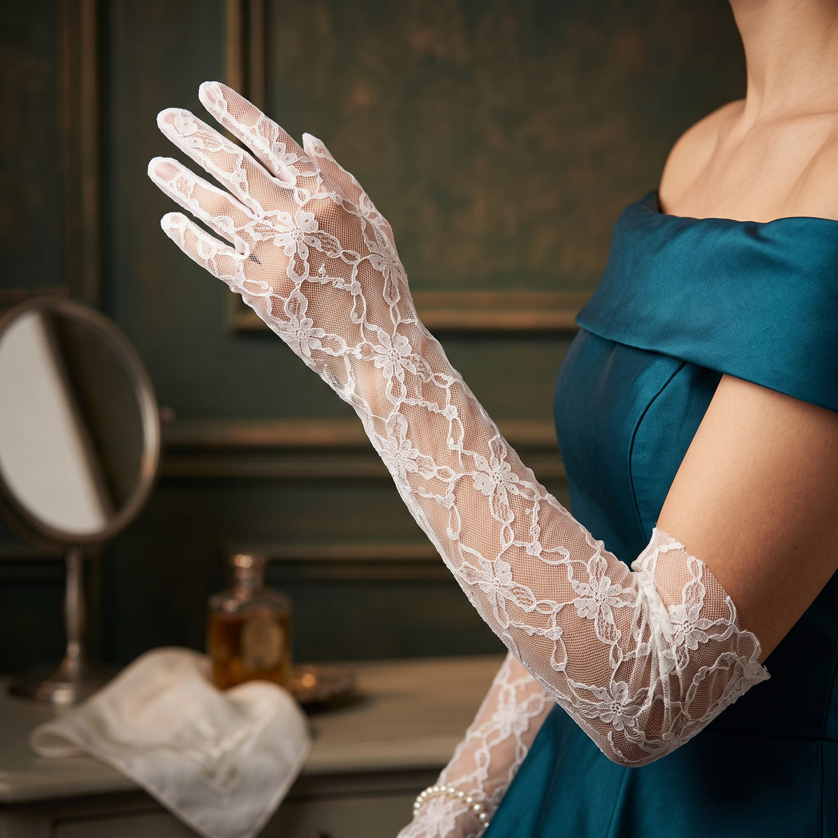 Above-elbow white gloves in a bold open floral lace, fingers covered.