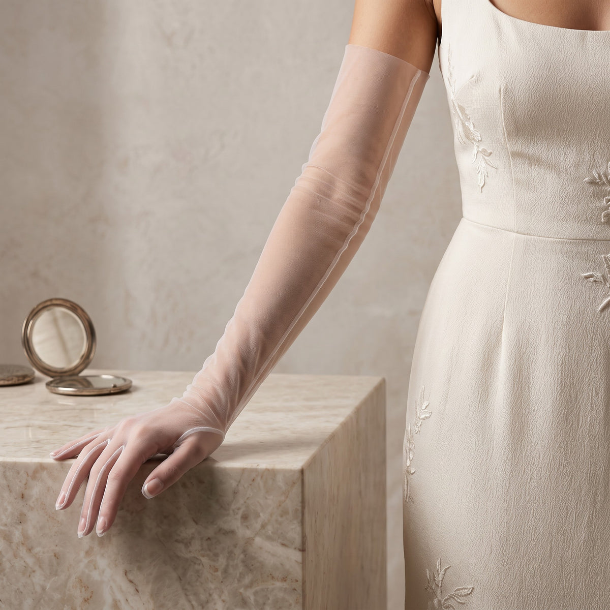 Above-elbow white sheer tulle gloves, plain and unlined, fingers covered.