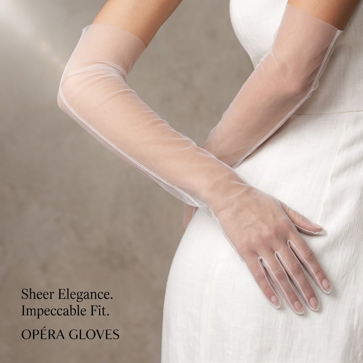 Above-elbow white sheer tulle gloves, plain and unlined, fingers covered.