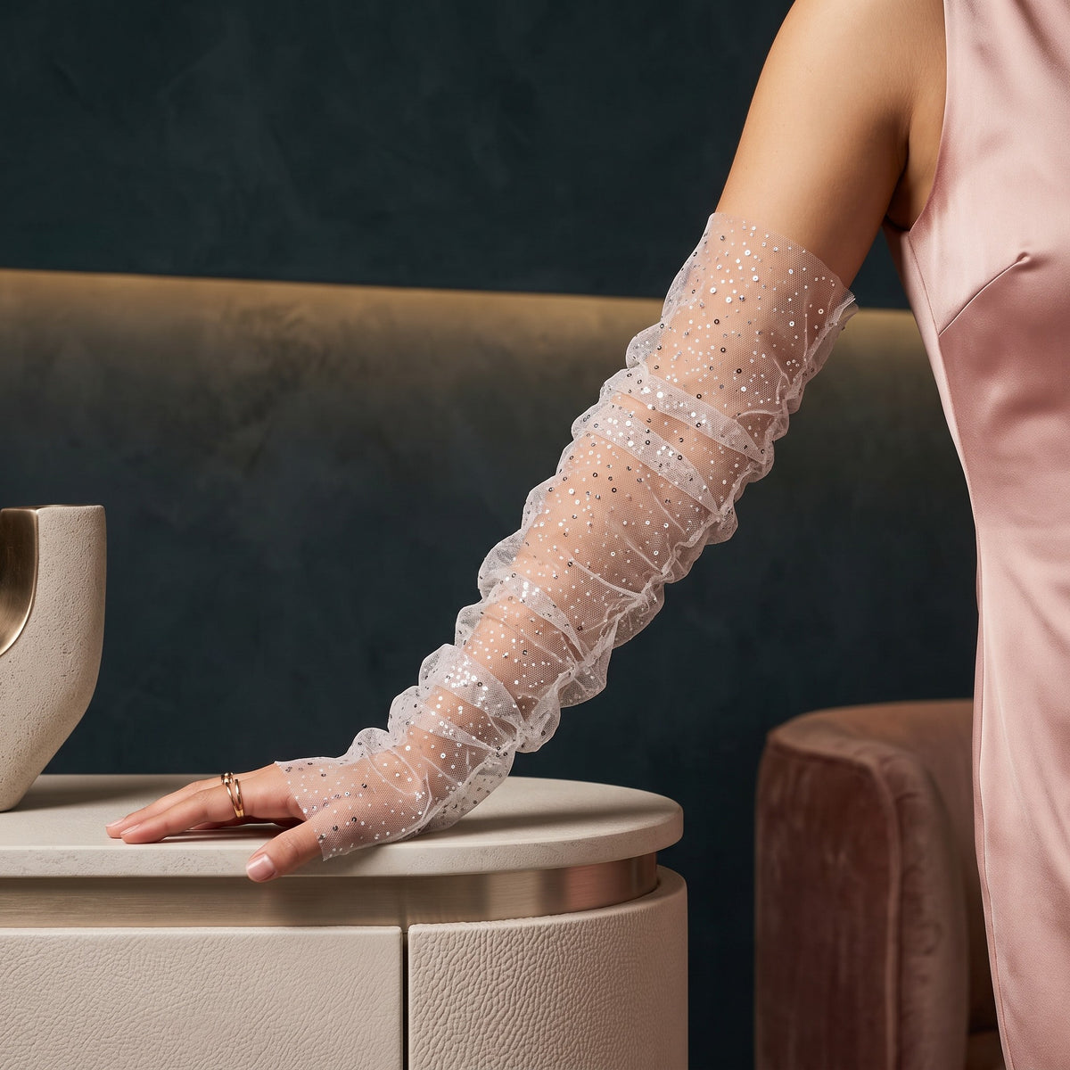 White tulle arm cuffs sewn with small sequins, fingerless, ruffle edge.