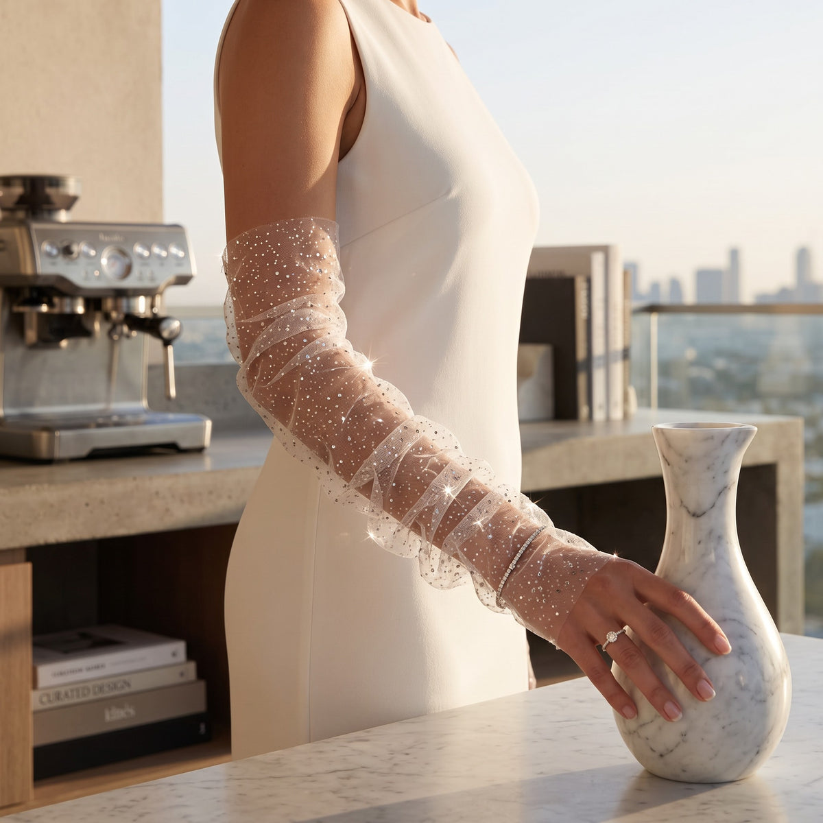 White tulle arm cuffs sewn with small sequins, fingerless, ruffle edge.