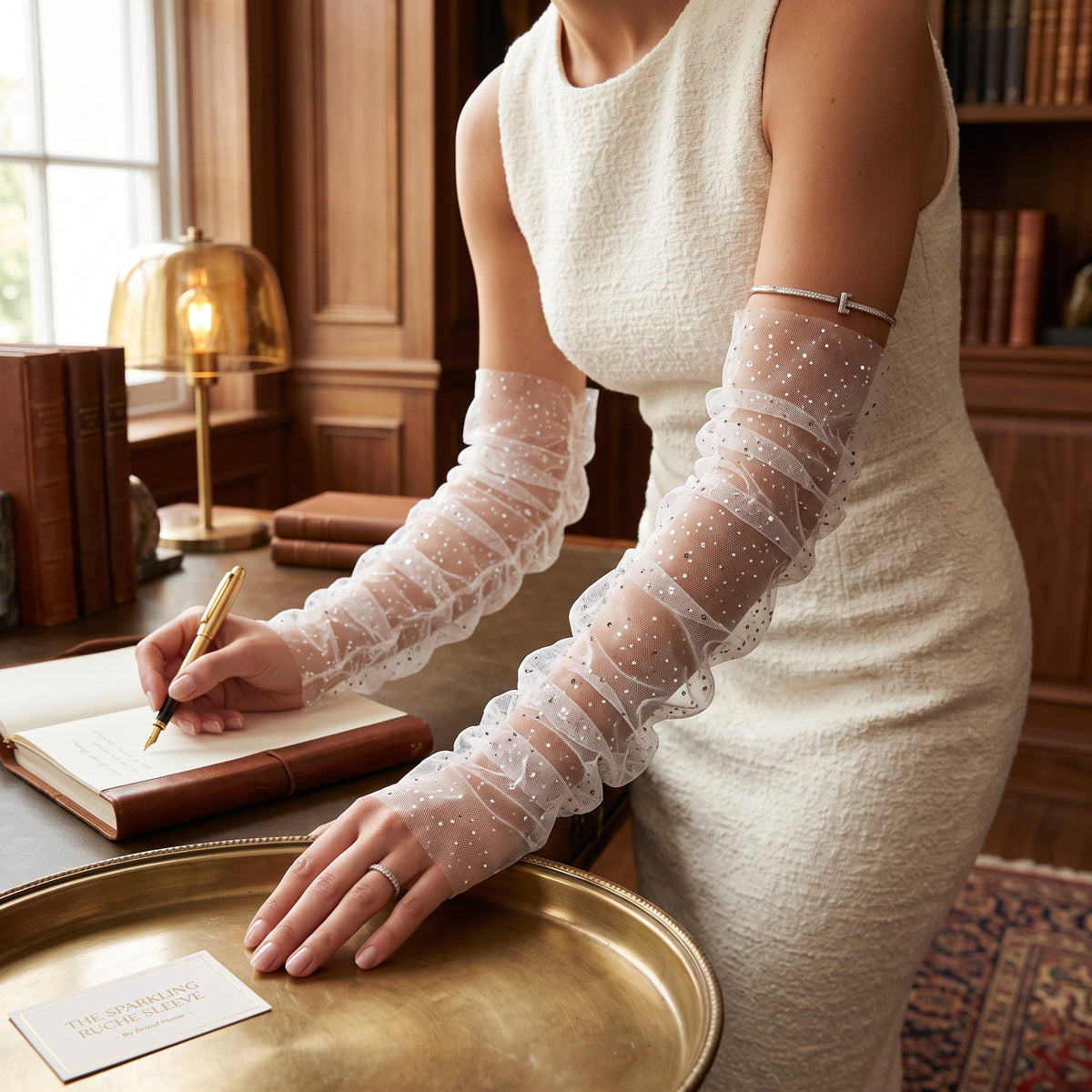 White tulle arm cuffs sewn with small sequins, fingerless, ruffle edge.