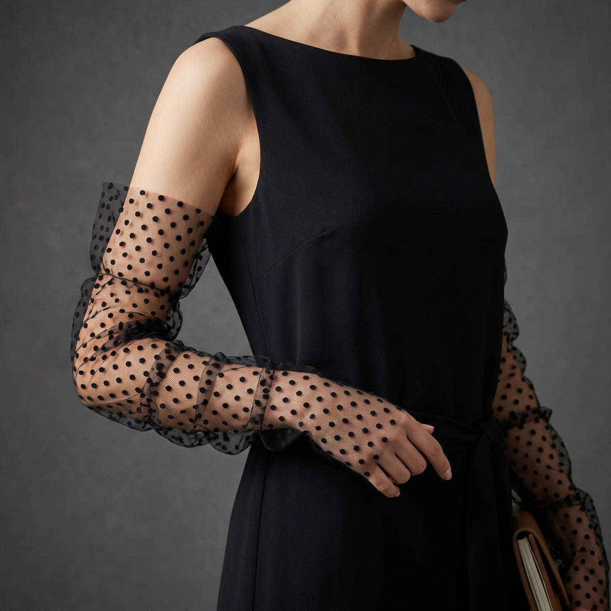 Black polka dot tulle arm cuffs, fingerless, ruched with a ruffle edge.