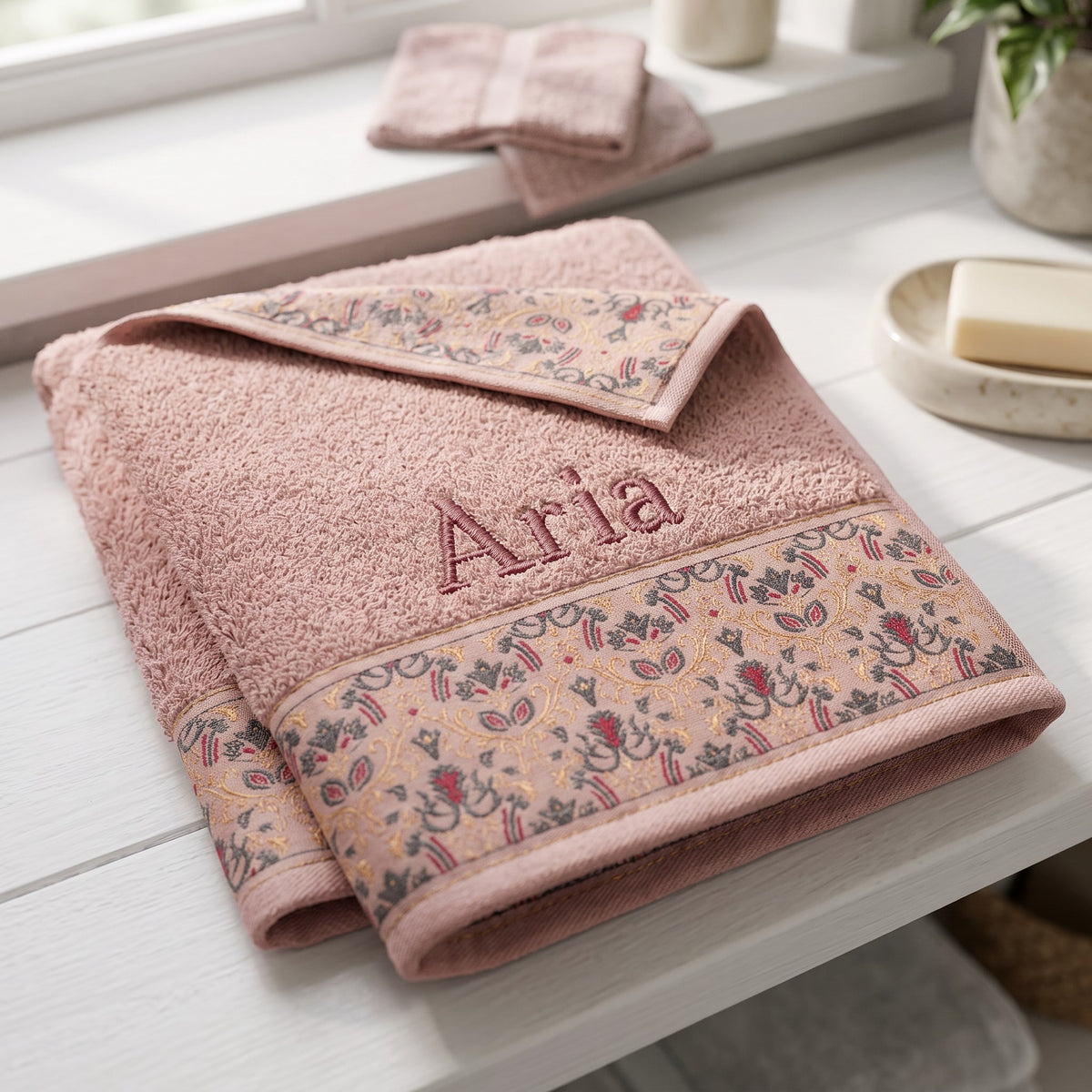 Aria personalized hair towel, dusty rose serif embroidery on blush pink cotton with a patterned border — photo 2