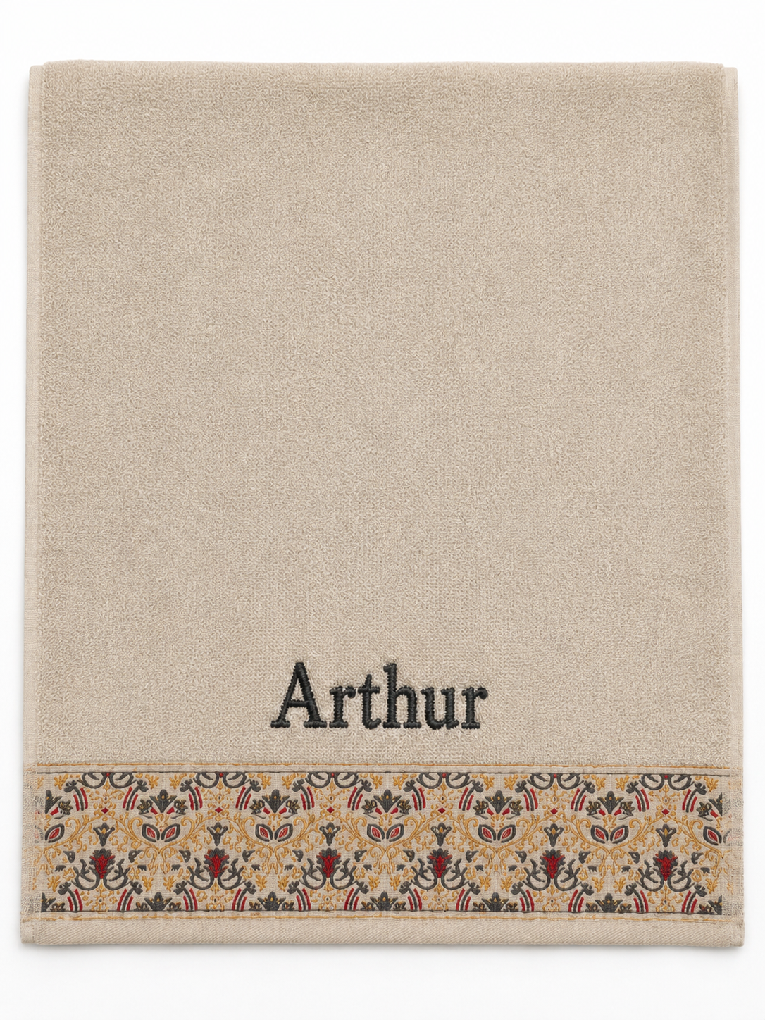Arthur personalized hair towel, charcoal grey serif embroidery on cream cotton with a patterned border
