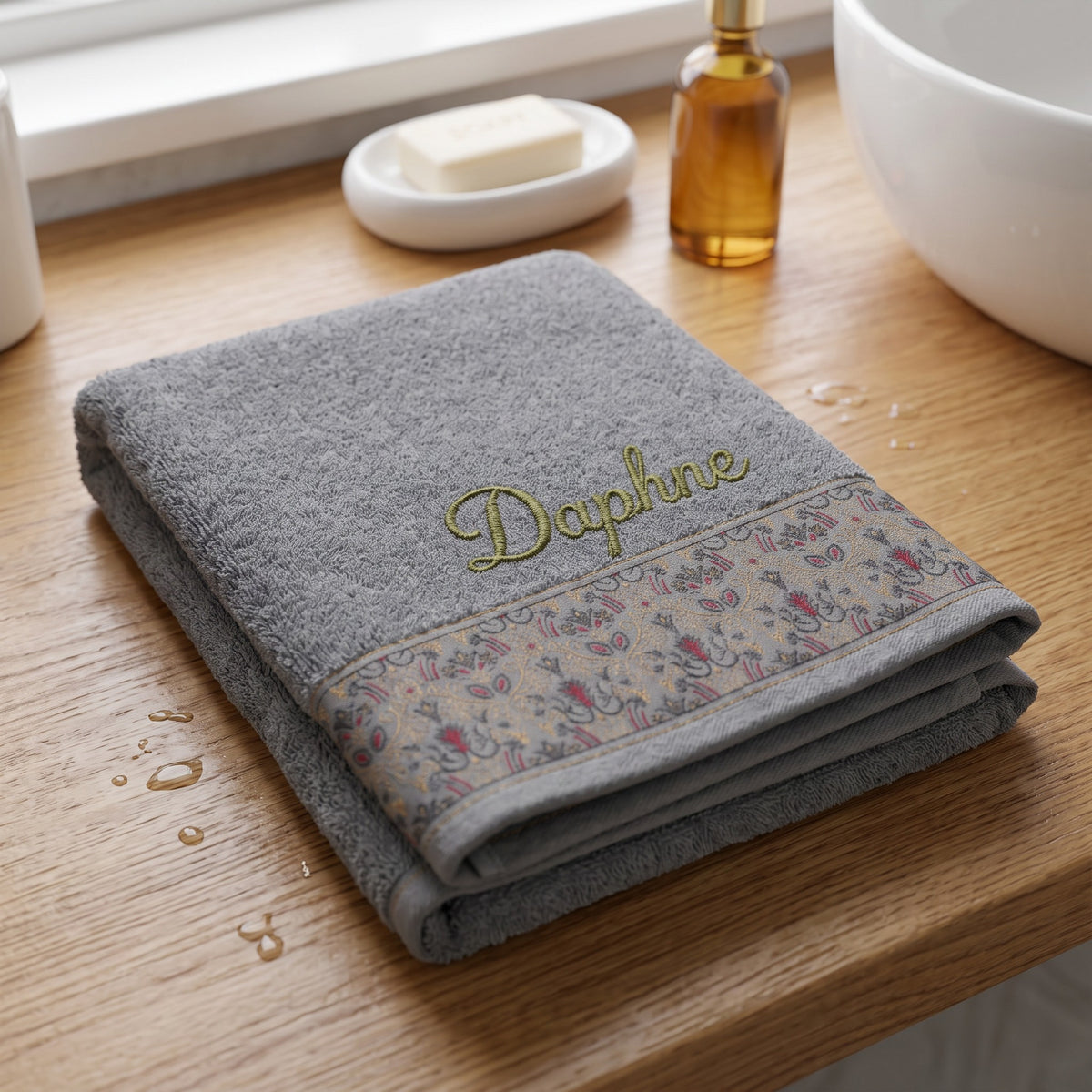 Daphne personalized hair towel, olive green script embroidery on light gray cotton with a patterned border — photo 4