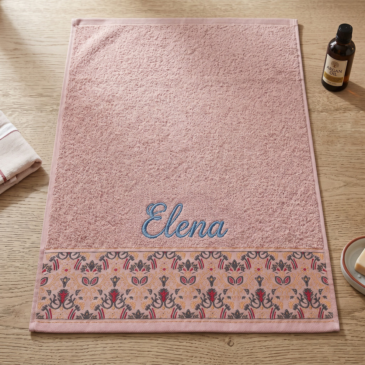Elena personalized hair towel, cornflower blue script embroidery on blush pink cotton with a patterned border — photo 2