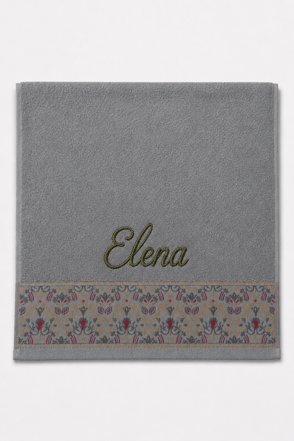 Elena personalized hair towel, olive green script embroidery on light gray cotton with a patterned border