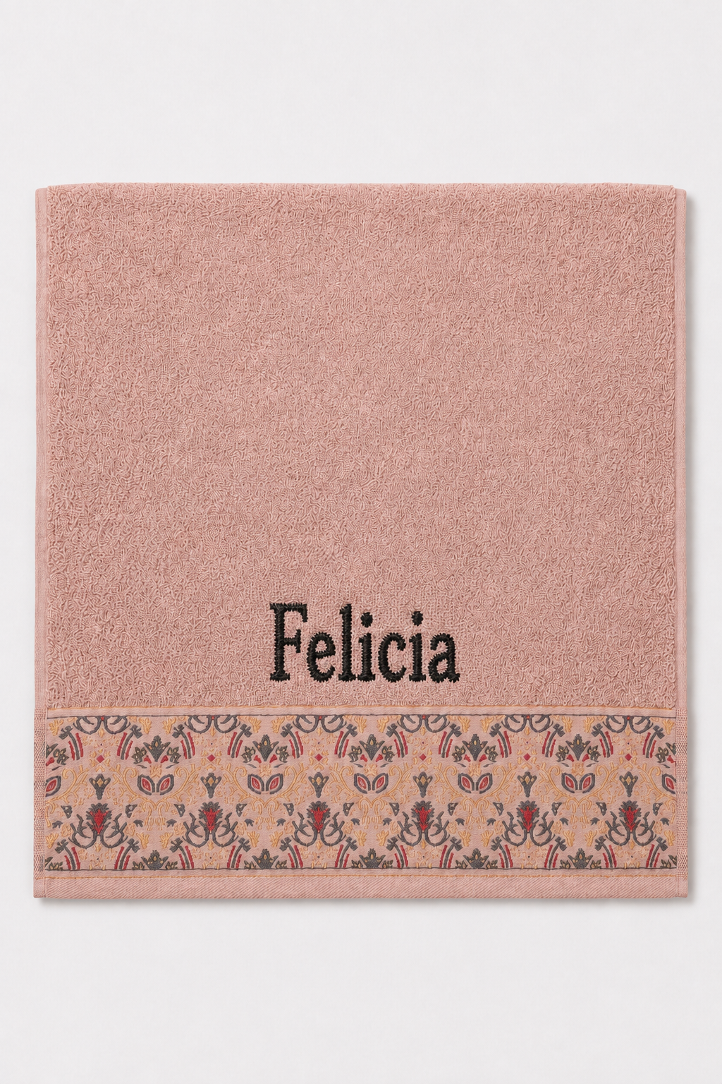 Felicia personalized hair towel, black serif embroidery on blush pink cotton with a patterned border