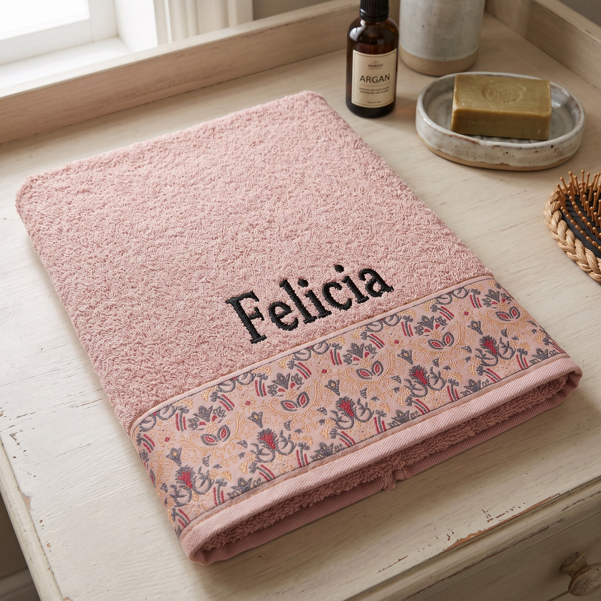 Felicia personalized hair towel, black serif embroidery on blush pink cotton with a patterned border — photo 2