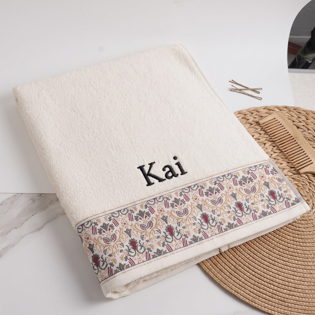 Kai personalized hair towel, black serif embroidery on ivory cotton with a patterned border — photo 2