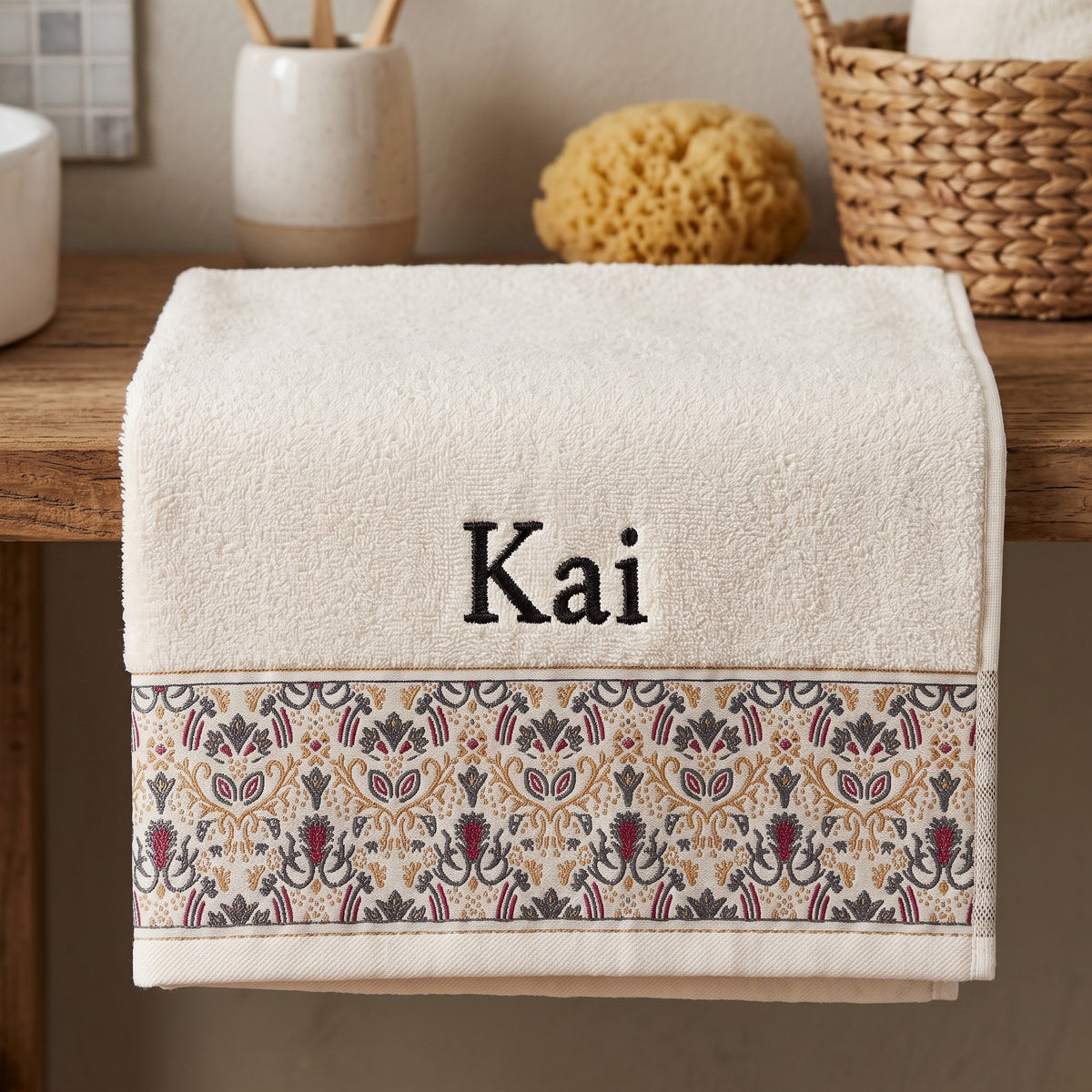 Kai personalized hair towel, black serif embroidery on ivory cotton with a patterned border — photo 3