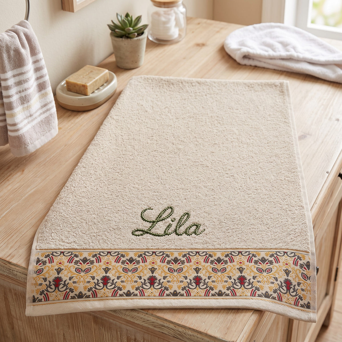 Lila personalized hair towel, olive green script embroidery on cream cotton with a patterned border — photo 5