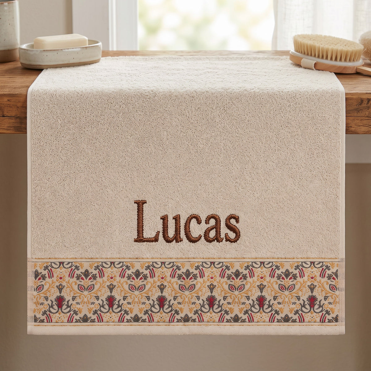 Lucas personalized hair towel, brown serif embroidery on cream cotton with a patterned border — photo 5