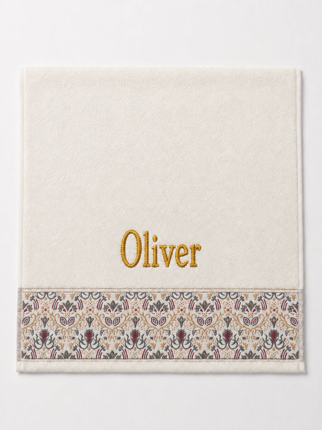 Oliver personalized hair towel, gold serif embroidery on ivory cotton with a patterned border