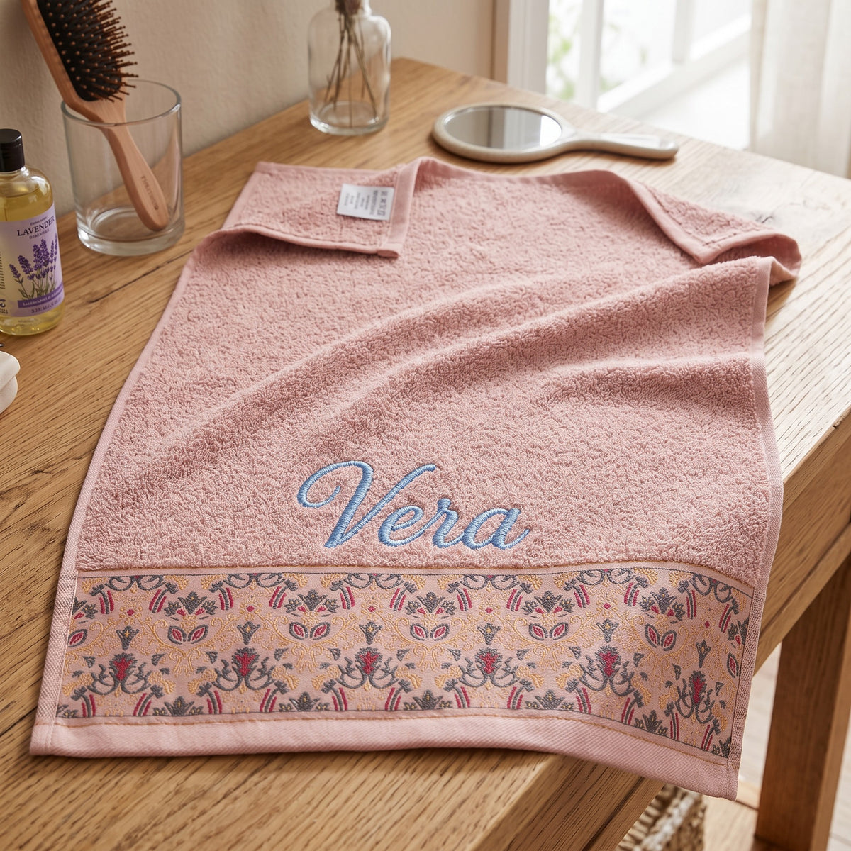 Vera personalized hair towel, blue script embroidery on blush pink cotton with a patterned border — photo 5