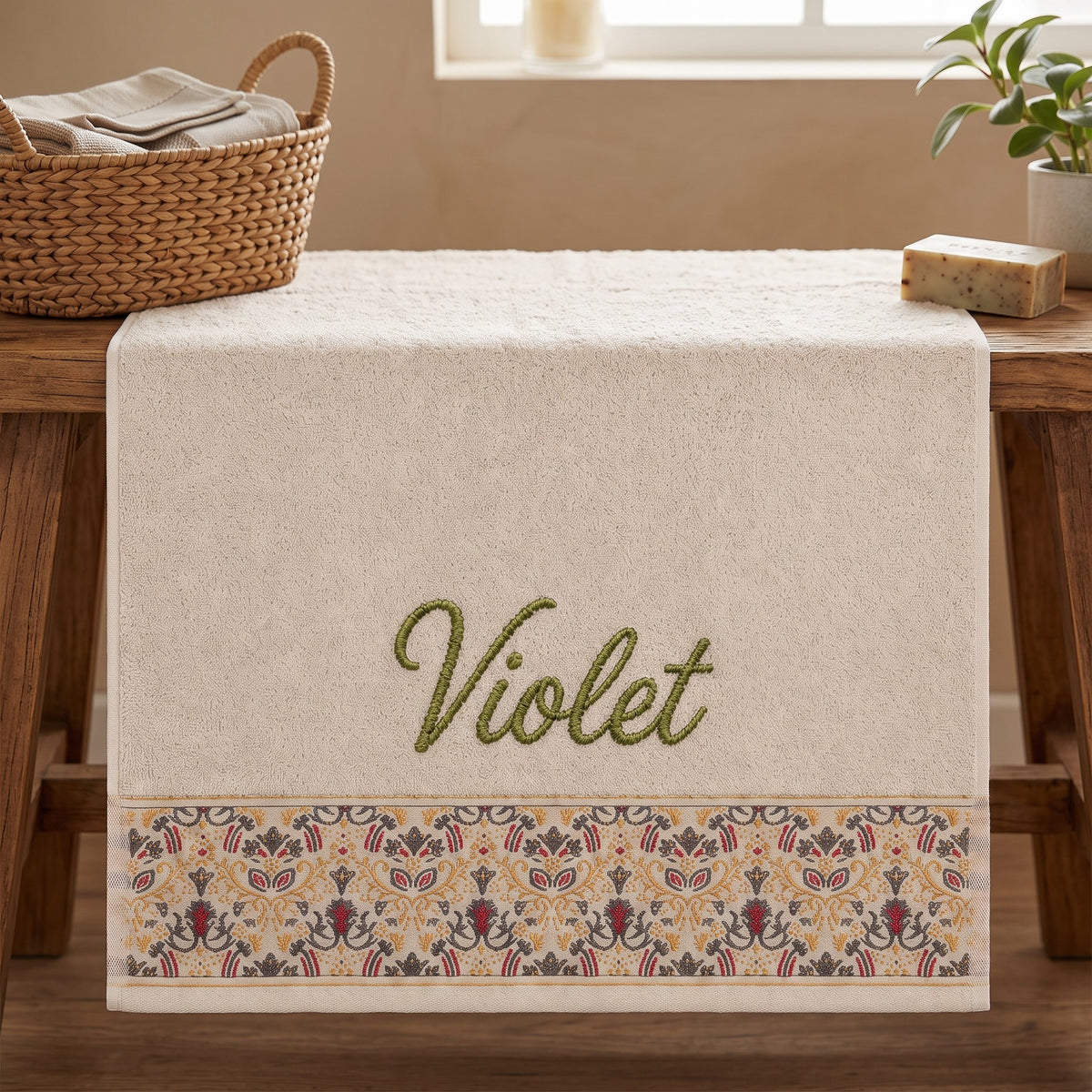 Violet personalized hair towel, olive green script embroidery on cream cotton with a patterned border — photo 2