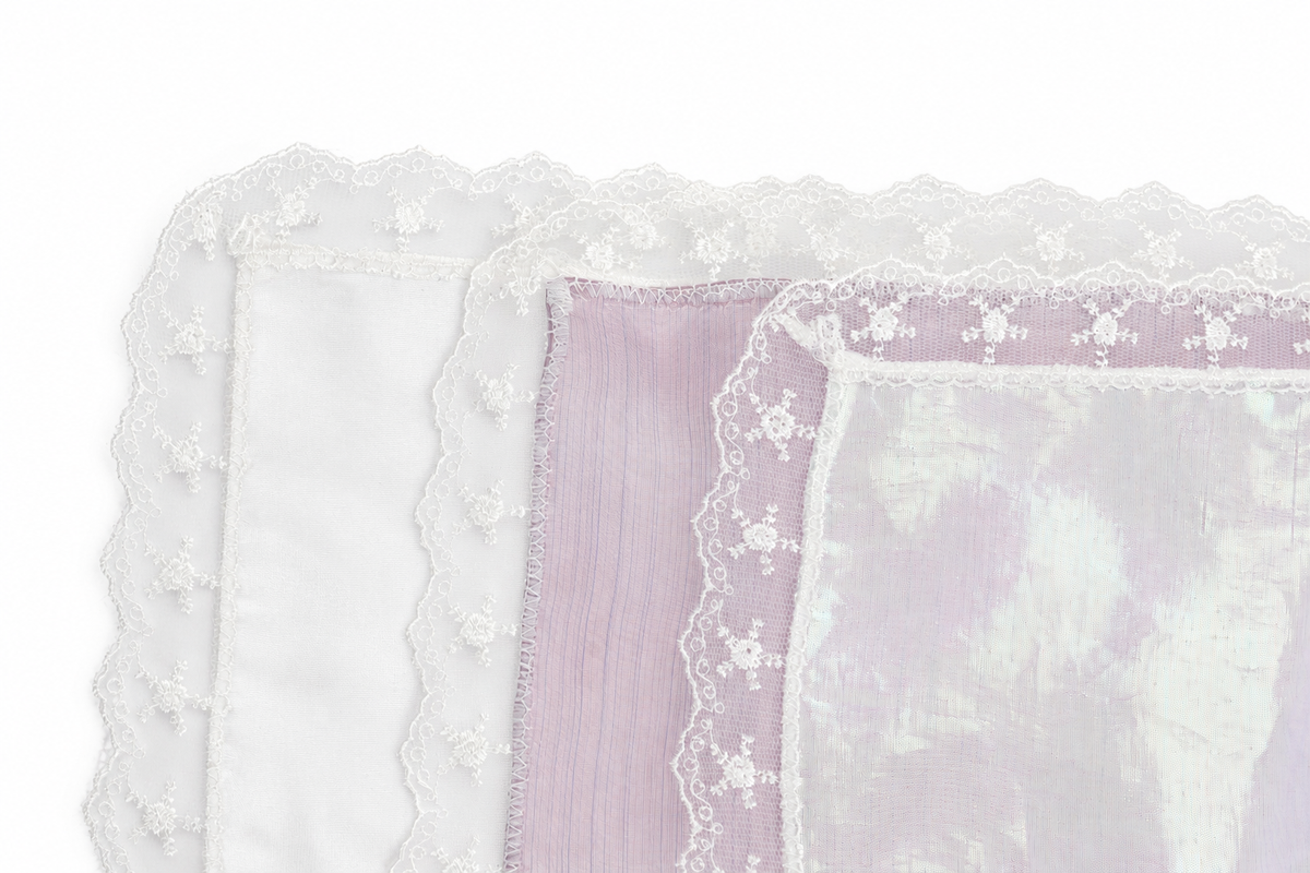 Plain organza handkerchiefs in shiny white, iridescent lilac and rainbow, with lace edges