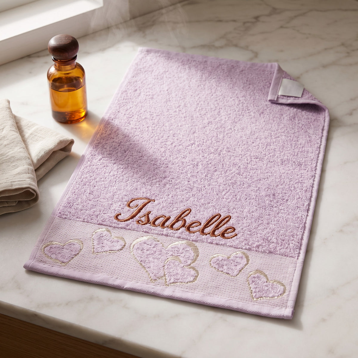 Isabelle personalized heart hand towel, terracotta script embroidery on lilac cotton — photo 3
