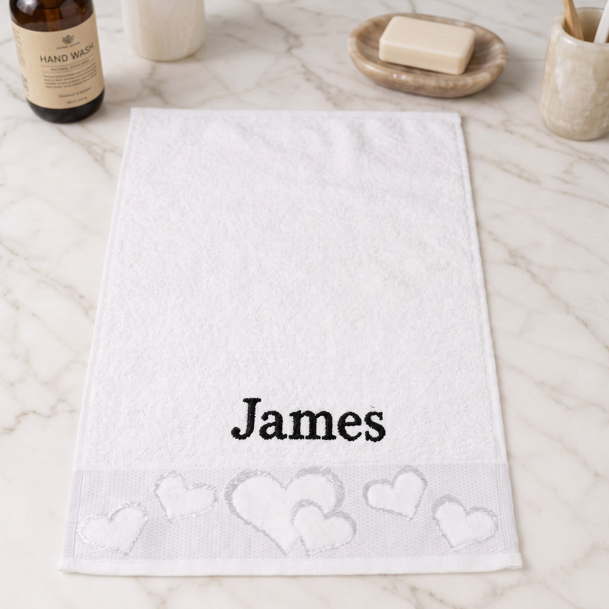 James personalized heart hand towel, black serif embroidery on white cotton — photo 5