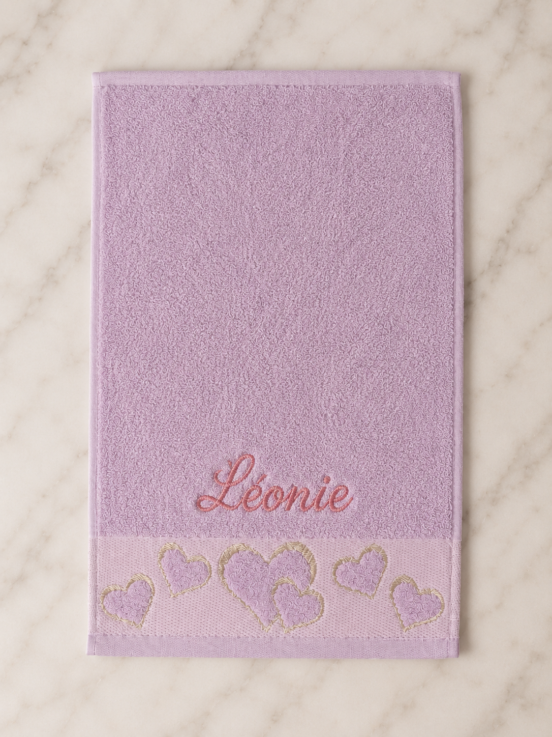 Léonie personalized heart hand towel, rose pink script embroidery on lilac cotton
