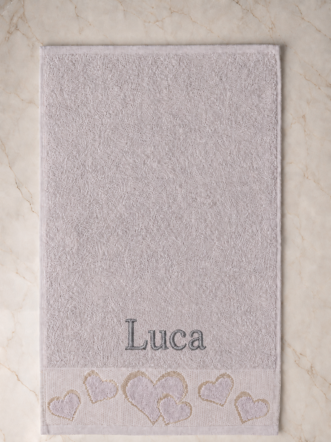 Luca personalized heart hand towel, charcoal grey serif embroidery on mauve cotton