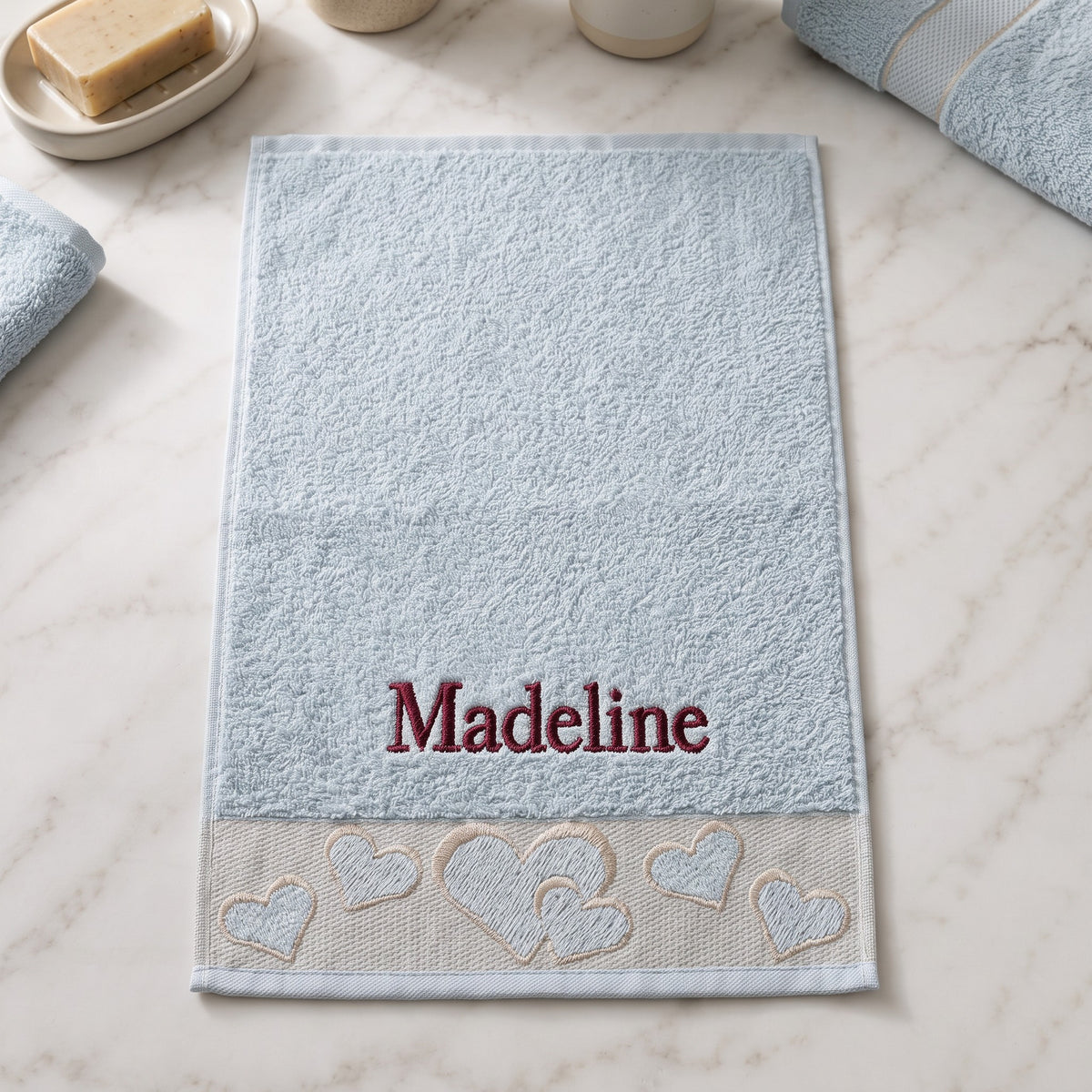 Madeline personalized heart hand towel, burgundy serif embroidery on baby blue cotton — photo 4