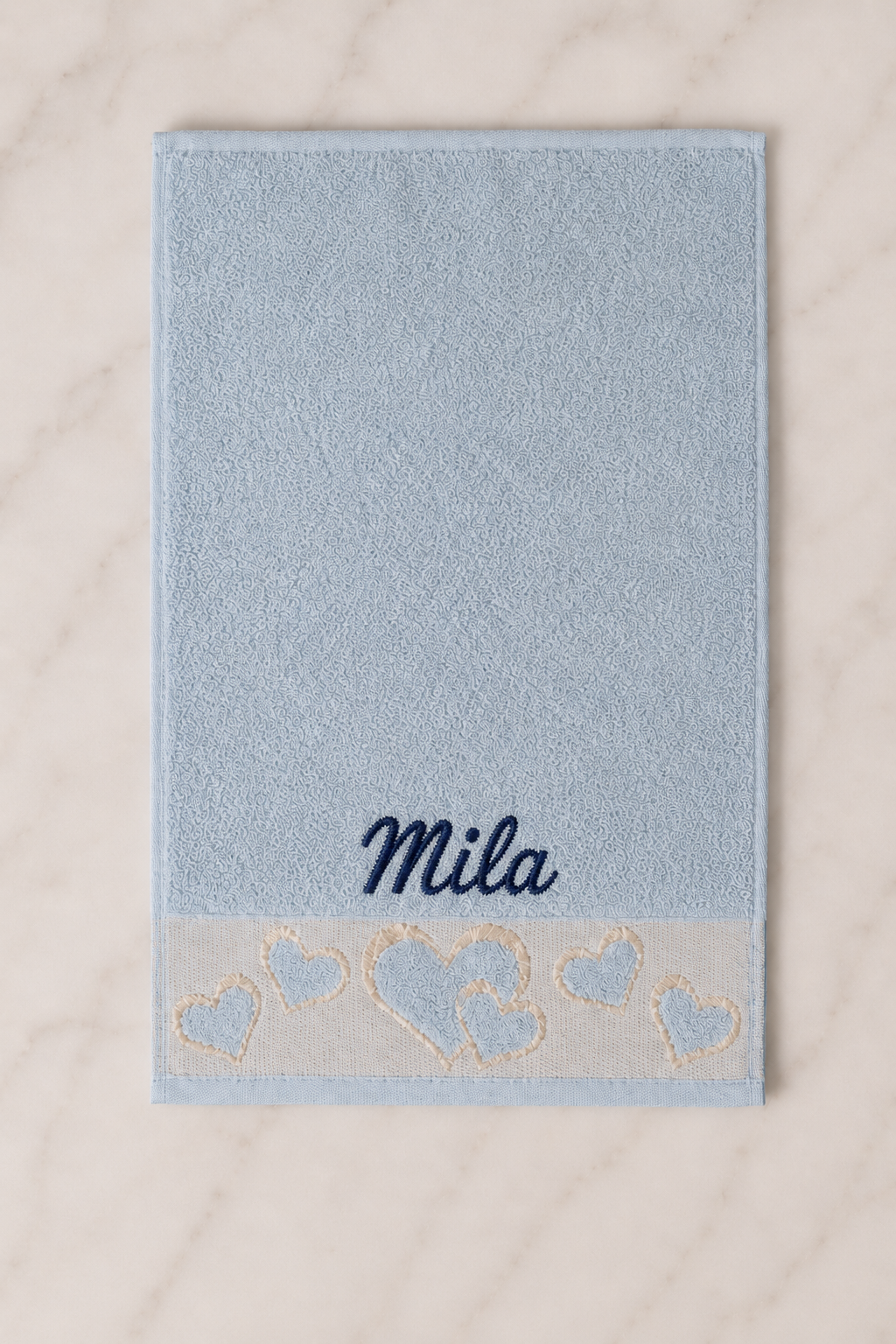 Mila personalized heart hand towel, navy script embroidery on baby blue cotton