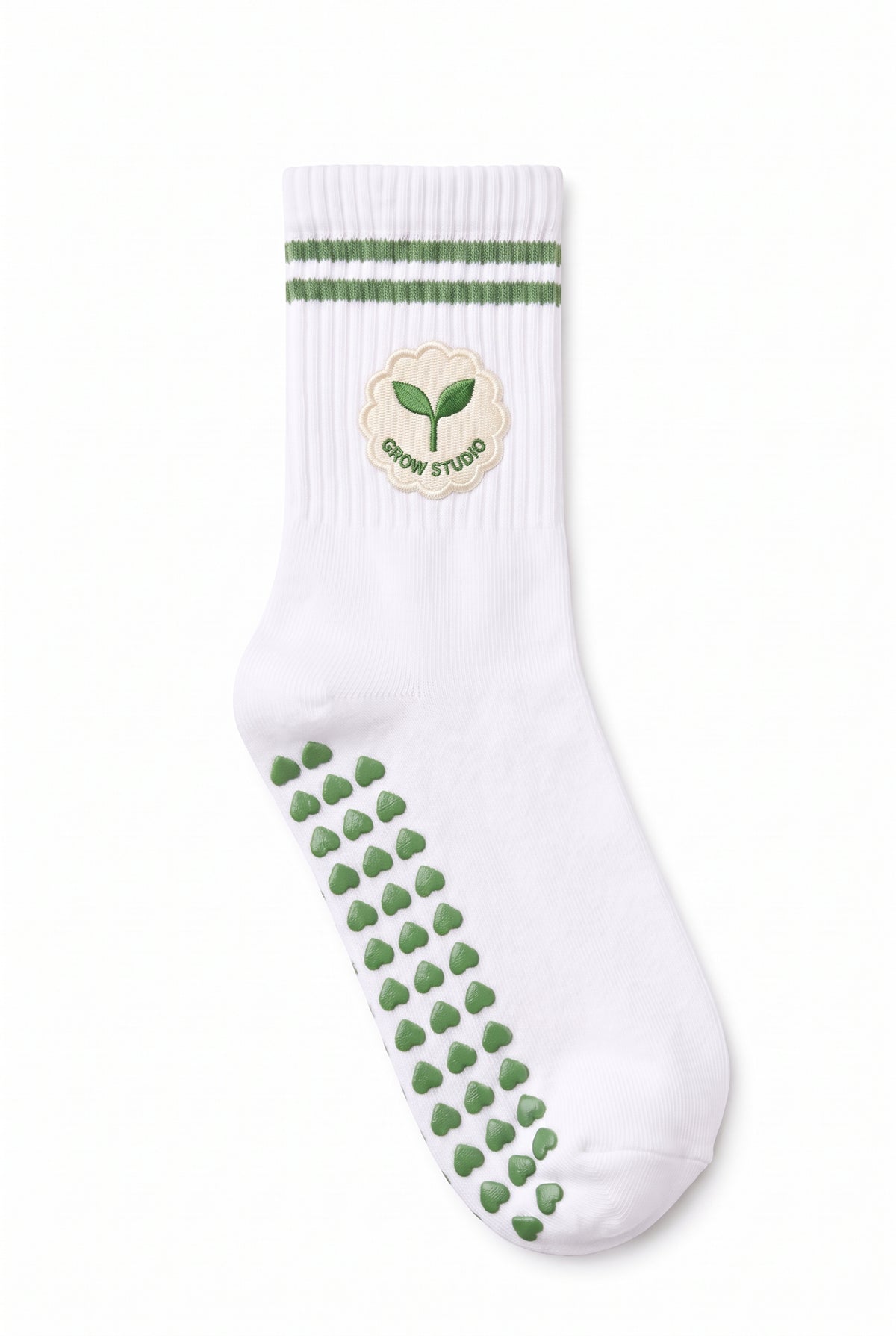 Green crew pilates grip socks with custom embroidery on the cuff
