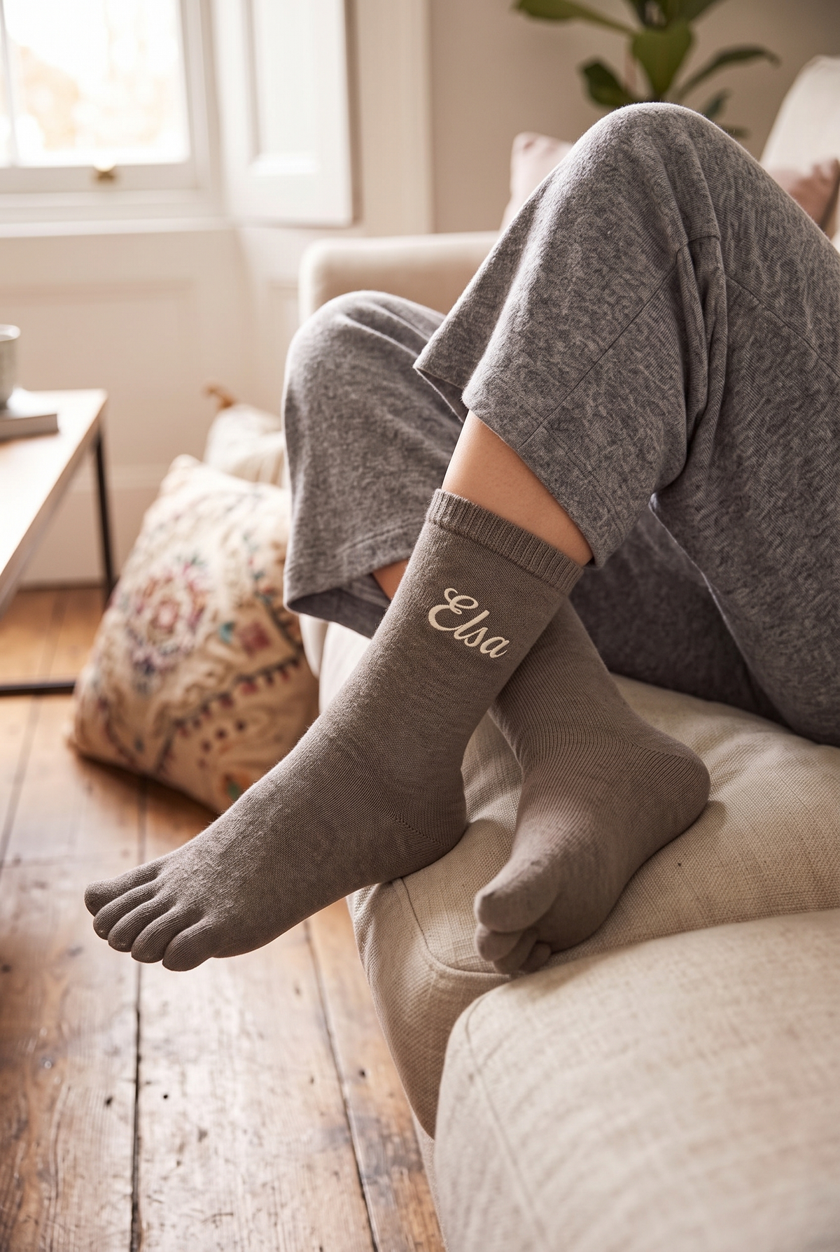 Model wearing khaki embroidered toe socks